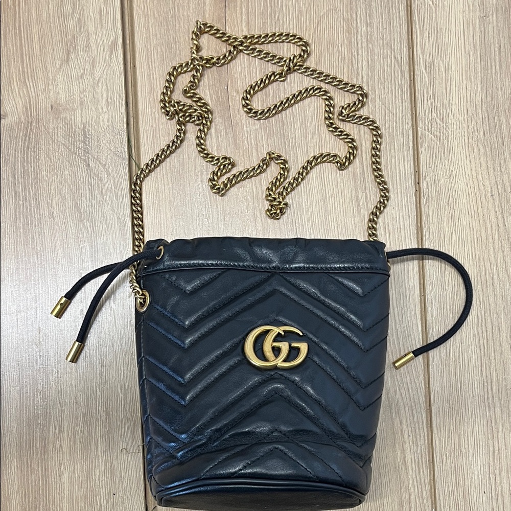 Gucci Quilted Black Bucket Crossbody with Brass Accents